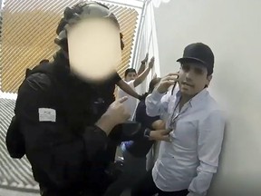 Screenshot of a handout video showing the arrest of alleged trafficker Ovidio Guzman, son of jailed drug kingpin Joaquin "Chapo" Guzman, on October 17, 2019.