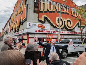 There's No Place Like This Place, Anyplace focuses on the gentrification of the Bloor/Bathurst corner and Mirvish Village by Toronto director Lulu Wei. Now-retired Toronto Sun photographer Michael Peake is shown at the far left videotaping the moment while on assignment.