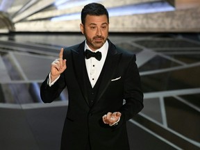 Comedian Jimmy Kimmel delivers a speech during the opening of the Academy Awards show on March 4, 2018 in Hollywood.