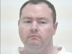 John Joseph Macindoe, 33, of Calgary, is pictured in this photo provided by the Calgary Police.