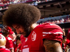 San Francisco 49ers quarterback Colin Kaepernick prepares to take the field before an NFL game against the Tampa Bay Buccaneers in 2016.