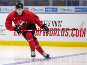 In this Jan. 1, 2020, file photo, Canada's Alexis Lafreniere skates during practice at the World Junior Championship in Ostrava, Czech Republic.
