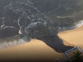 "Black water" flows into Acapulco Bay in Acapulco, Guerrero, Mexico June 25, 2020 in this picture obtained from social media. Picture taken June 25, 2020.