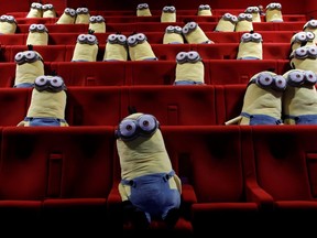 Minions toys are seen on cinema chairs to maintain social distancing between spectators at a MK2 cinema in Paris June 22, 2020.