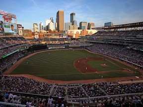 Fans watch as the Minnesota Twins play the New York Yankes at Target Field in Minneapolis July 2, 2013.