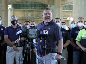 New York Police Benevolent Association President Mike OMeara and representatives from other NYPD and law enforcement unions holds a news confenece at the Icahn Stadium parking lot June 9, 2020 in New York.