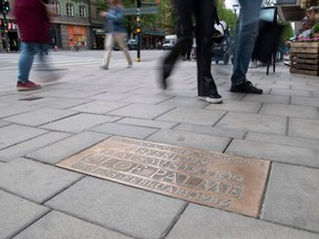 A picture taken on June 8, 2020 shows a memorial plaque in central Stockholm, where late Swedish Prime Minister Olof Palme was murdered in February 1986.