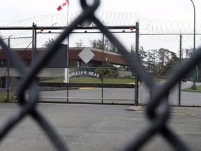 William Head Institution is shown through a security fence in Victoria, B.C., on Wednesday, Feb. 27, 2008.