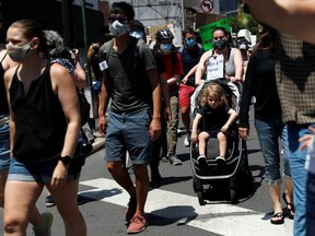 Familes and children march in Brooklyn.