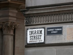 A "Harriet Tubman Street" sign is seen on Ingram Street, in the aftermath of protests against the death of George Floyd who died in police custody in Minneapolis, Glasgow, Britain, June 8, 2020. REUTERS