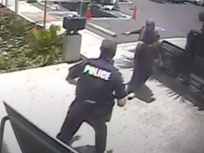 Surveillance video shows the moment Heba Momtaz Al-Azhari lunged at a police officer with a knife.