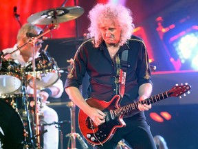 British rock band Queen performs in front of a nearly sold out audience at the Scotiabank Saddledome in Calgary, Alta. on June 26, 2014.