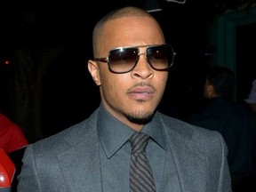 Rapper T.I. (Clifford Joseph Harris Jr) Arriving At The Stevie Wonder Birthday Party At Peppermint Night Club in West Hollywood.