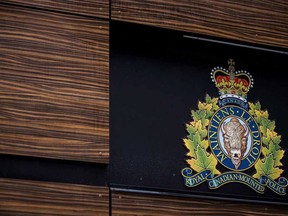 The RCMP logo is seen outside Royal Canadian Mounted Police "E" Division Headquarters, in Surrey, B.C., on Friday April 13, 2018.