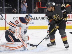 Mikko Koskinen of the Edmonton Oilers defends the net against Ryan Reaves of the Vegas Golden Knights at T-Mobile Arena on February 26, 2020 in Las Vegas.