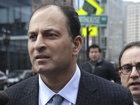 David Sidoo leaves following his federal court hearing in a nationwide college admissions cheating scheme in Boston, March 15, 2019.