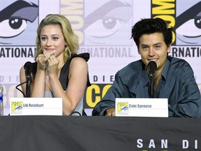 Lili Reinhart and Cole Sprouse speak at 2019 Comic-Con International at San Diego Convention Center on July 21, 2019 in San Diego.