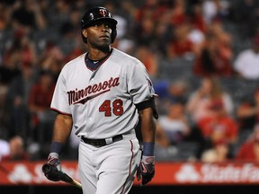 Torii Hunter of the Minnesota Twins reacts after striking out against the Los Angeles Angels at Angel Stadium of Anaheim on July 21, 2015 in Anaheim.