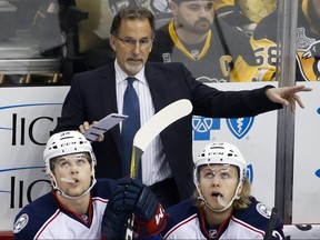 In this Friday, Feb. 3, 2017, file photo, Columbus Blue Jackets head coach John Tortorella gestures to an official in Pittsburgh.