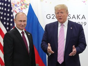 Russian President Vladimir Putin and U.S. President Donald Trump hold a meeting on the sidelines of the G20 summit in Osaka on June 28, 2019.