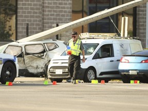 SIU investigators at the scene of a multiple car collision at the intersection at Torbram Rd. and Countryside Dr. In Brampton on Thursday, June 18. A 37-year-old woman and her three young daughters were killed in the crash.