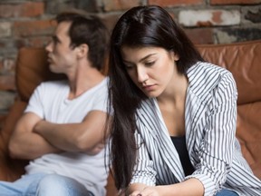 Sad pensive young girl thinking of relationships problems after fight