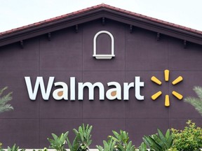 In this file photo taken on May 23, 2019, a Walmart store logo is seen on the building of a Walmart Supercenter in Rosemead, Calif.