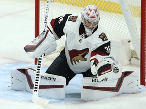 Arizona Coyotes goaltender Darcy Kuemper makes a glove save off a Winnipeg Jet in Winnipeg in March. 
Xavier A. Gutierrez became the first Latino president and CEO in NHL history when the Coyotes announced his new role Monday.
