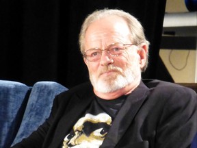 Dan Hicks attends a panel with cast and crew of both Evil Dead 1 and 2, hosted by Bruce Campbell, at the 2015 Wizard World Chicago on August 22, 2015.
