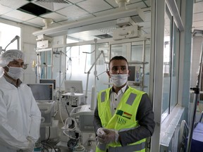 A nurse and a trainer are pictured during a training for operating ventilators, recently provided by the World Health Organization, for the intensive care ward of a hospital allocated for coronavirus patients in preparation for any possible spread of the coronavirus disease (COVID-19), in Sanaa, Yemen.
The WHO urged countries on Monday to press on with efforts to contain the novel coronovirus, noting the pandemic was worsening globally and had not peaked in central America.

"More than six months into the pandemic this is not the time for any country to take its foot off the pedal," WHO Director General Tedros Adhanom Ghebreyesus told an online briefing.