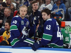 Vancouver Canucks youngsters Elias Pettersson (left) and Quinn Hughes, shown at the NHL All-Star Weekend in St. Louis in January, made quite an impression on the National Hockey League in the 2019-20 season.