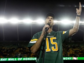 Ricky Ray speaks to the crowd during his Edmonton Eskimos Wall of Honour induction ceremony at Commonwealth Stadium on Sept. 20, 2019.