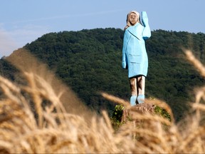 A life-sized wooden sculpture of U.S. first lady Melania Trump is officially unveiled in Rozno, near her hometown of Sevnica, Slovenia, July 5, 2019.