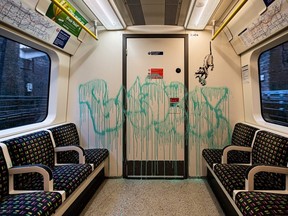 An artwork by Banksy is seen on a London underground carriage, Britain, in this undated picture obtained from social media.