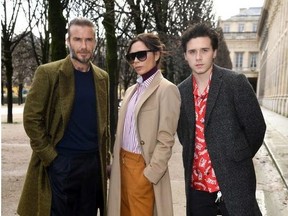 David Beckham, Victoria Beckham and Brooklyn Beckham attend the Louis Vuitton Menswear Fall/Winter 2018-2019 show as part of Paris Fashion Week on January 18, 2018 in Paris, France.