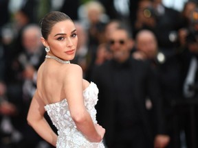 US model and actress Olivia Culpo arrives for the screening of the film "Sibyl" at the 72nd edition of the Cannes Film Festival in Cannes, southern France, on May 24, 2019.