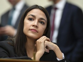 Rep. Alexandria Ocasio-Cortez (D-NY) listens as Facebook Chairman and CEO Mark Zuckerberg testifies before the House Financial Services Committee on "An Examination of Facebook and Its Impact on the Financial Services and Housing Sectors" in the Rayburn House Office Building in Washington, D.C. on Oct. 23, 2019.