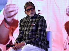 In this file photo taken on August 27, 2019 Bollywood actor Amitabh Bachchan takes part in a launch event for the water conservation effort "Mission Paani" in Mumbai.