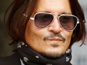 Actor Johnny Depp arrives to attend the seven day of his libel trial against News Group Newspapers (NGN), at the High Court in London, on July 15, 2020.