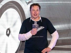 In this file photo taken on Jan. 7, 2020, Tesla CEO Elon Musk speaks during the Tesla China-made Model 3 Delivery Ceremony in Shanghai.