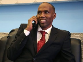 In this file photograph taken on February 23, 2017, Somalia's newly appointed Prime Minister Hassan Ali Kheyre, also spelt Khaire, speaks on a cellphone in Mogadishu.