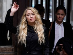 Actress Amber Heard arrives at the High Court for the final day of the libel trial by her former husband, actor Johnny Depp, against News Group Newspapers in London, England, on Tuesday, July 28, 2020.