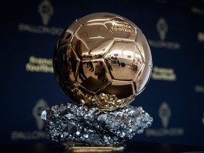 In this file photo taken Sept. 19, 2019, the Ballon d'Or trophy is displayed during a press conference to present the new Ballon d'Or trophy, on the outskirts of Paris.