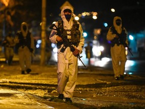 Colombian soldiers patrol the streets in Bogota on July 15, 2020.