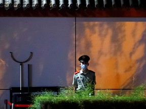 A police officer stands guard outside the U.S. Consulate General in Chengdu, Sichuan province, China July 24, 2020.