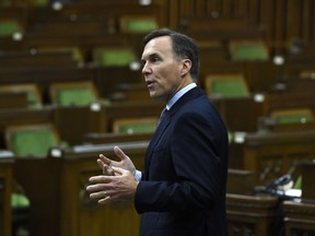 Finance Minister Bill Morneau rises during a meeting of the Special Committee on the COVID-19 pandemic in the House of Commons on Parliament Hill in Ottawa, on Wednesday, June 17, 2020.
