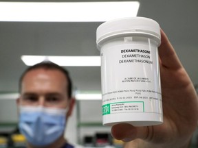A pharmacist displays Dexamethasone at the Erasme Hospital amid the coronavirus disease outbreak, in Brussels, Belgium, June 16, 2020.