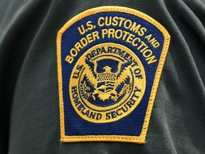 A U.S. Customs and Border Protection patch is seen on the arm of a U.S. Border Patrol agent July 1, 2019.