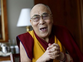 Tibetan spiritual leader the Dalai Lama talks with journalists in Geneva, Switzerland March 11, 2016.