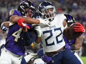 Derrick Henry of the Tennessee Titans carries the ball against the Baltimore Ravens during the AFC Divisional Playoff game at M and T Bank Stadium on January 11, 2020 in Baltimore.